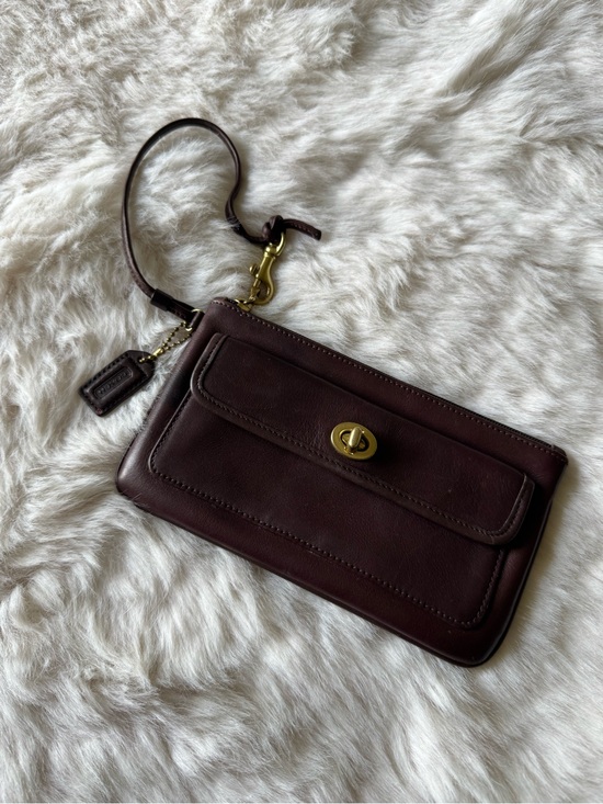Coach Handbags - Coach Dark Brown Leather Turnlock Wristlet